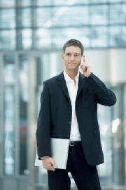 Bizman_with_Laptop_and_cellphone.JPG