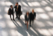 Bizpeople_walking_and_talking.JPG